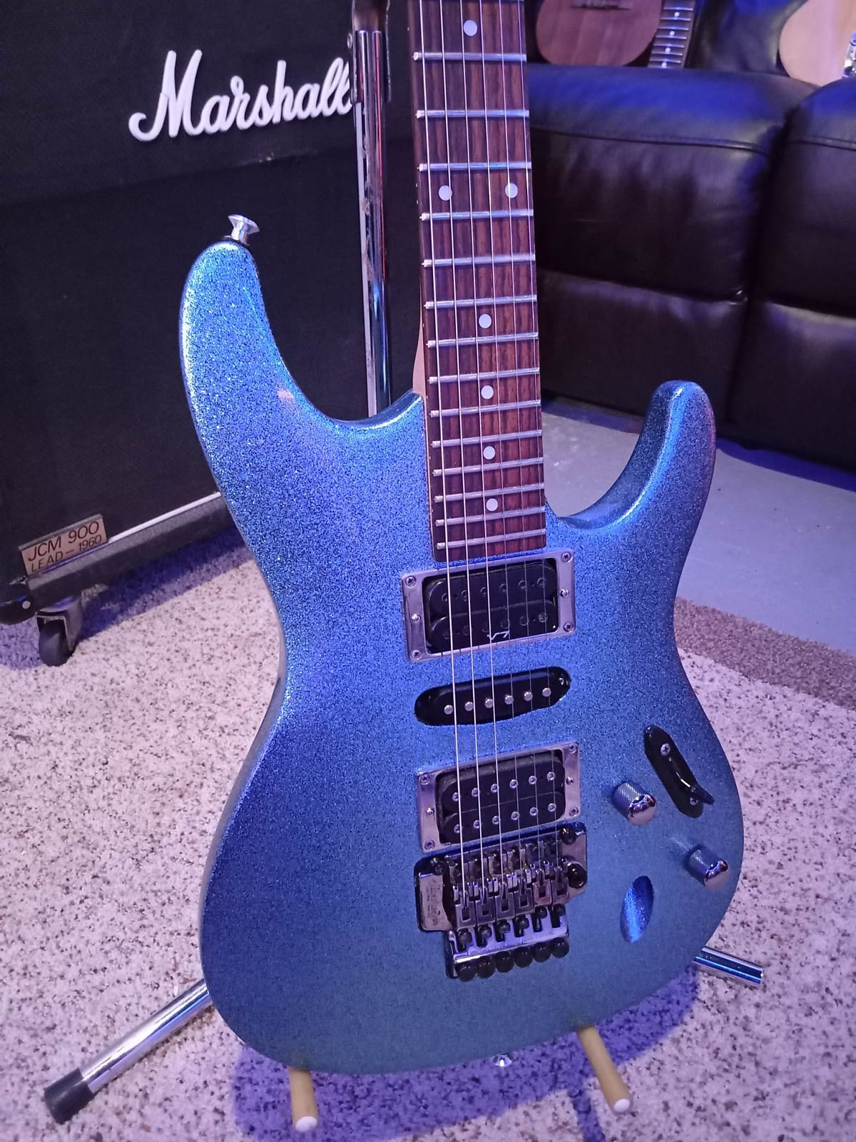 Ibanez S470 Sparkle Blue Custom paint with upgraded middle pickup.
